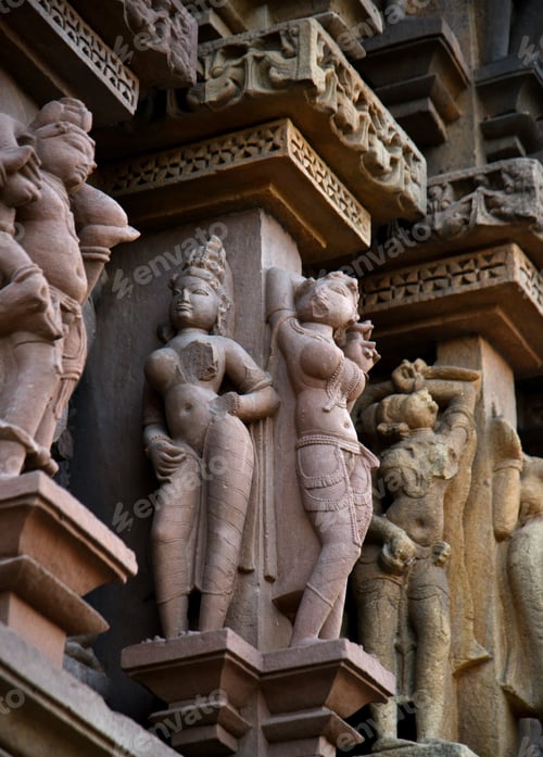 Preview: Sculpture of erotic woman on Khajuraho Temple.