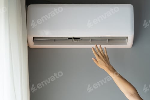 Preview: Woman stretches hand to catch stream of air and tries to warm up apartment to feel better