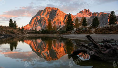 Preview: Autumn in the Dolomites mountains by lake Limides.