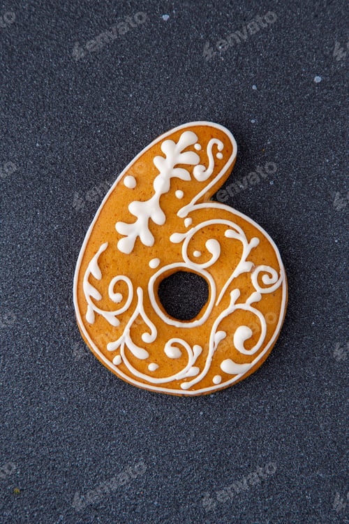 Preview: Decorated Gingerbread Cookie Number Six. Food Christmas decor.
