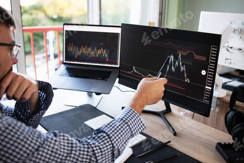 Preview: Investor monitor the stock market data.