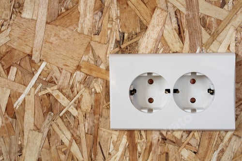 Preview: New white double power socket on the wooden wall in new house