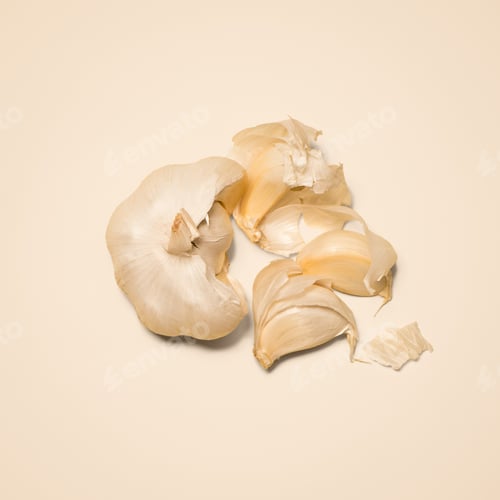Preview: The key to deliciousness. Shot of garlic cloves against a studio background.