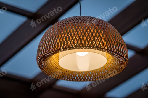 Preview: Interior of the outdoor terrace with a wicker wood ceiling lamp.