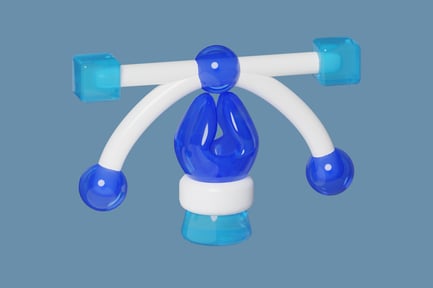 Aperçu: Jouet bleu en forme de larme, de sphère et de cube.