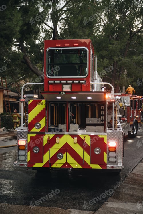 Preview: Fire truck and firefighters work to put out a house fire