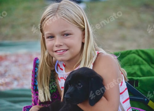 Preview: Two cute faces! A girl and her pup.