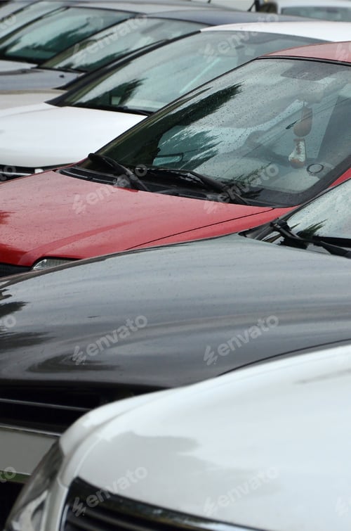 Preview: Roofs of several cars. A lot of cars stand close at rush hour