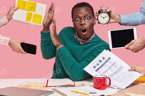 Preview: Astonished dark skinned young man has shocking facial expression, makes stop gesture, asks not bothe