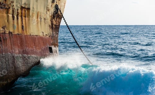 Preview: Moored shipwreck on a rocky coast line and wind waves. Paphos Cyprus