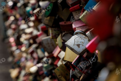Preview: many locks are locked on the wall together and hanging onto them