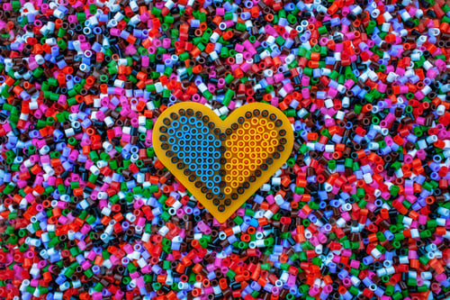 Preview: Yellow and blue heart showing colors of the Ukraine national flag on the colorful toy block