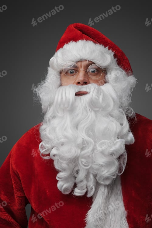 Preview: Bearded santa dressed in red costume isolated on grey