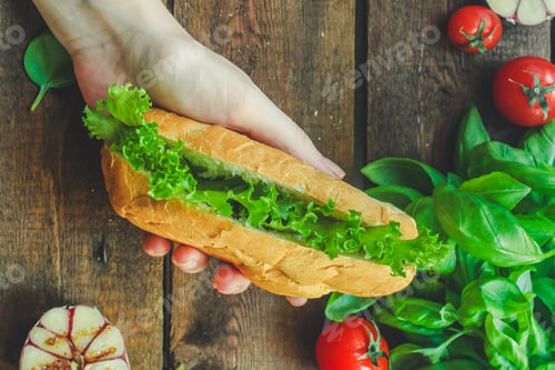 Preview: Sandwich With Lettuce Leaves And Bun (No Meat). Top Food Background. Copy Space