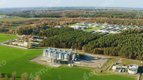 Preview: Aerial View Modern Granary, Grain-drying Complex, Commercial Grain Or Seed Silos And chicken farm In