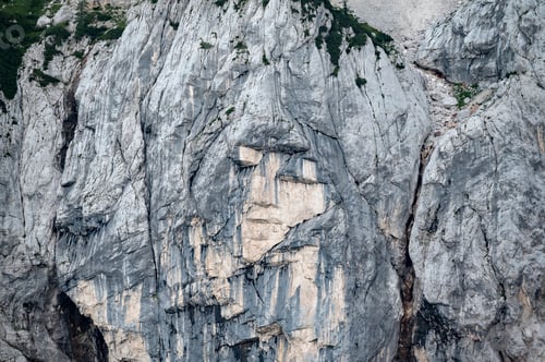 Preview: The pagan girl image of a womans face created by rock fractures