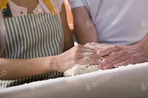 Preview: couple baking in kitchen