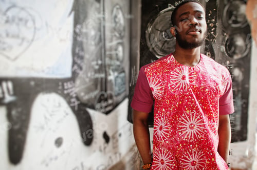 Preview: Black young man wearing african traditional clothes