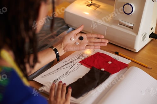 Preview: Fashion Designer Choosing Buttons
