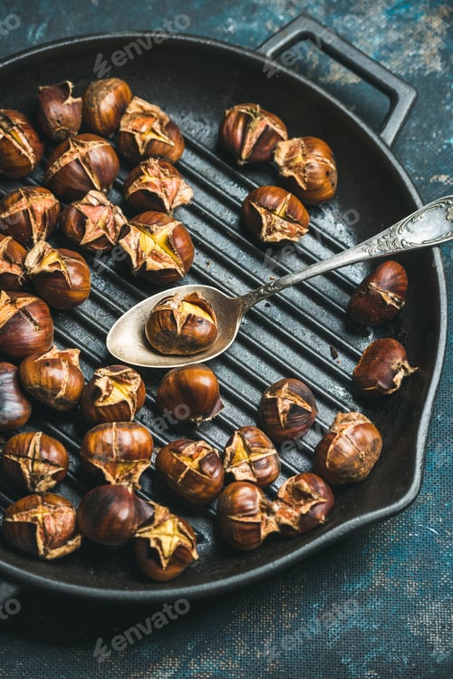 Preview: Close-up of roasted chestnuts and spoon