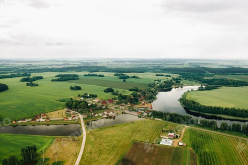 Preview: view from the height of the Lake in a green field in the form of a horseshoe and a village in the