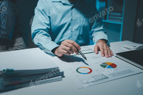 Preview: using computer together in office, successful business people working together in a co-working offic