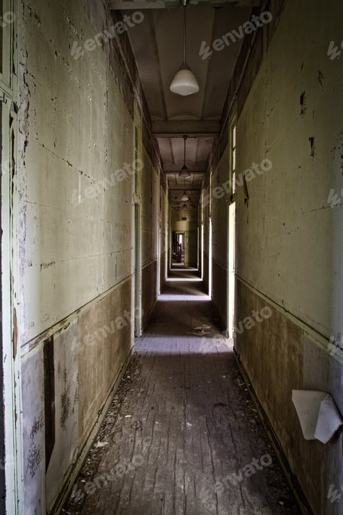 Preview: Vertical shot of a creepy corridor in an abandoned house