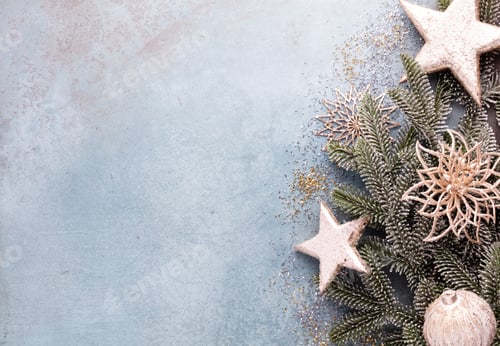 Preview: Christmas composition fir tree branches, gold sterne on blue background.