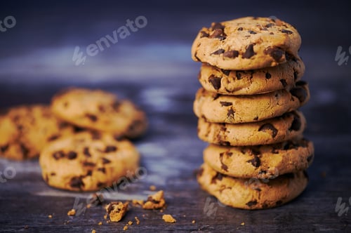 Preview: Stack of Chocolate Chip Cookies on Rustic Surface