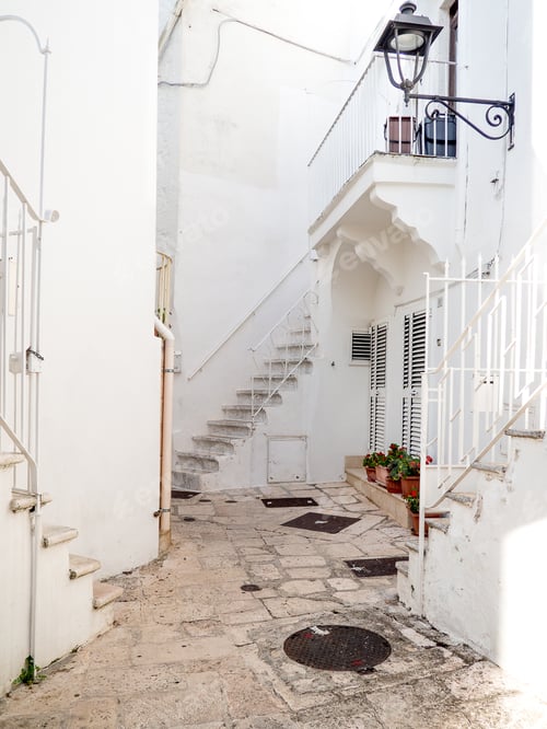 Preview: White Buildings and Cobblestone Streets in a European Town