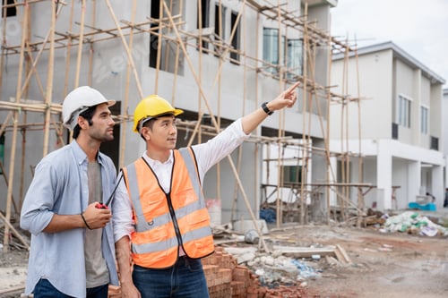 Preview: The engineer manager and foremen discussed and pointed to the site projects on the construction site