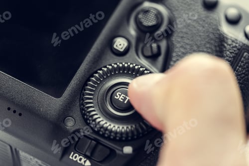 Preview: photographer with camera in hand