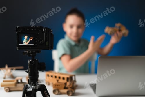 Preview: Young boy video blogger making stream with his followers