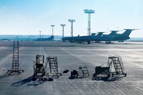 Preview: Airplane is being serviced by the ground crew.