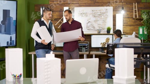 Preview: Slide view of focus transition with architects holding blue prints