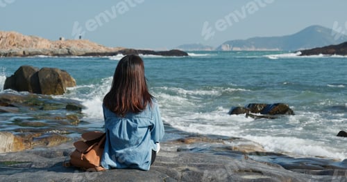 Preview: Woman enjoy the sea view
