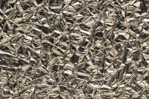 Preview: Texture Of A Crumpled Metal Foil Closeup For An Abstract Background Or For Festive Wallpaper Of