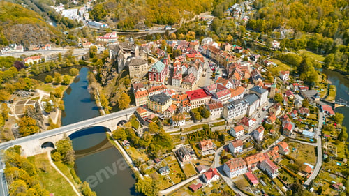 Preview: Loket castle surrounded by traditional Czech houses in autumn, near Karlovy Vary, Czech Republic
