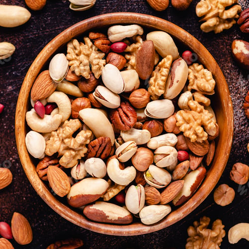 Preview: Various Nuts in wooden bowl