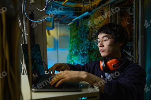 Preview: Young Asian Man Programming Server