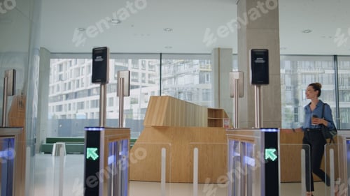 Preview: Woman unlocking electronic gates by modern smartwatch going to office work.