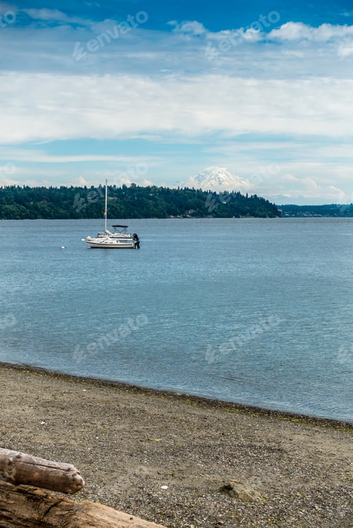 Preview: Two Boats Are Anchored In The Puget Sound With Mount Rainier In The Distance.