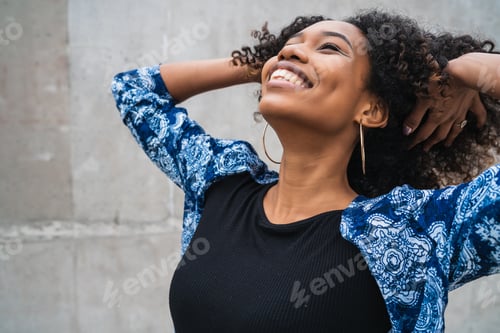 Preview: Afro-american woman happy and excited.