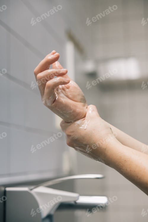 Preview: Medical personnel washing their hands in a Hospital