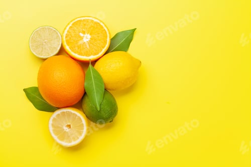 Preview: Fresh ripe citrus fruits on yellow background