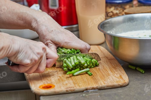 Preview: Chef cuts asparagus with knife to make baked goods with asparagus and peas. Step by step recipe