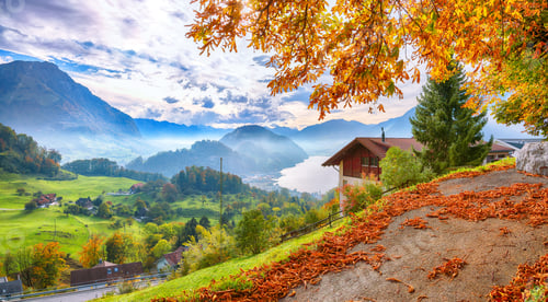 Preview: Exciting autumn view on suburb of Stansstad city and Lucerne lake with mountaines and fog