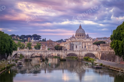 Preview: Scenic view of colorful sunrise over St Peters basilica in Rome
