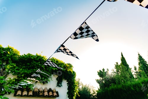 Preview: Hanging decoration pennants with the design of a checkered flag.