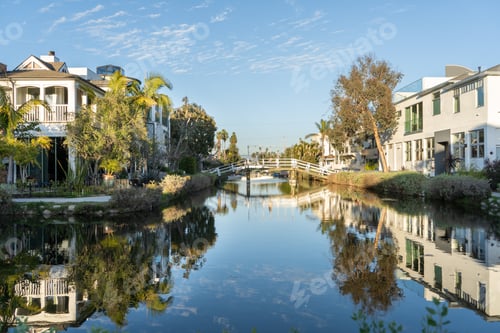 Preview: Venice Canals in Los Angeles, California with picturesque houses lining the waterways.